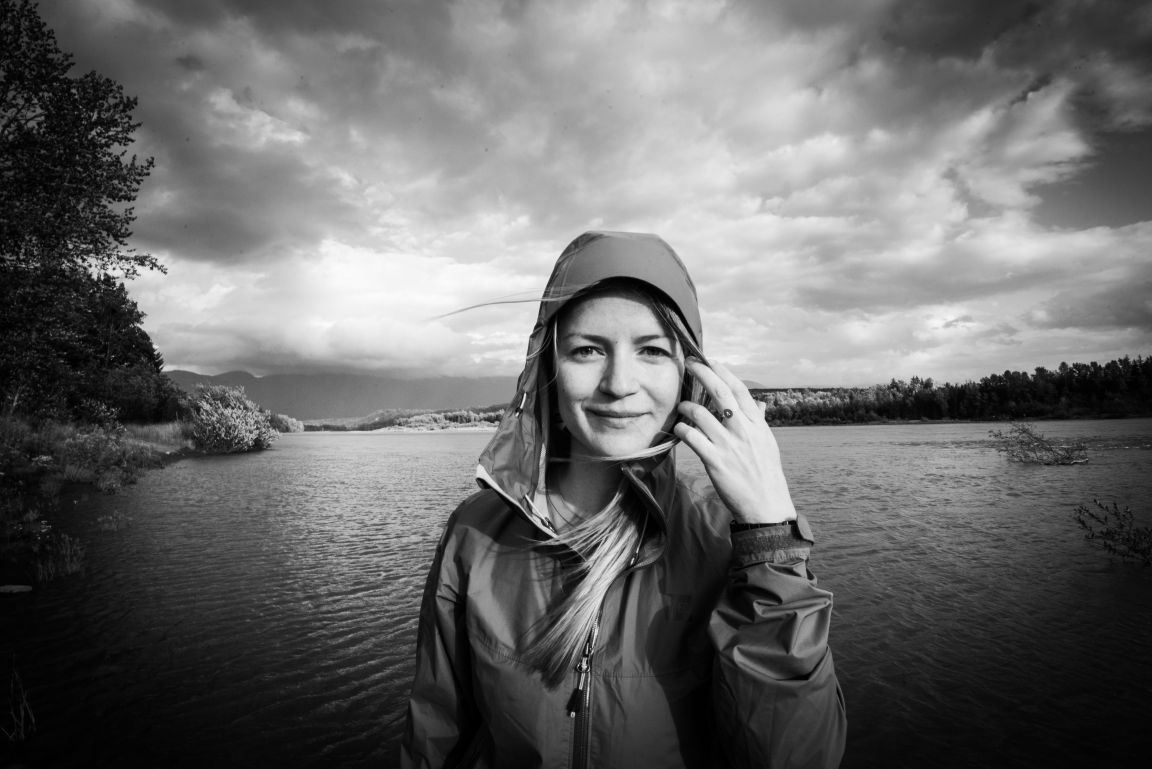 Dr. Andrea Reid standing by water