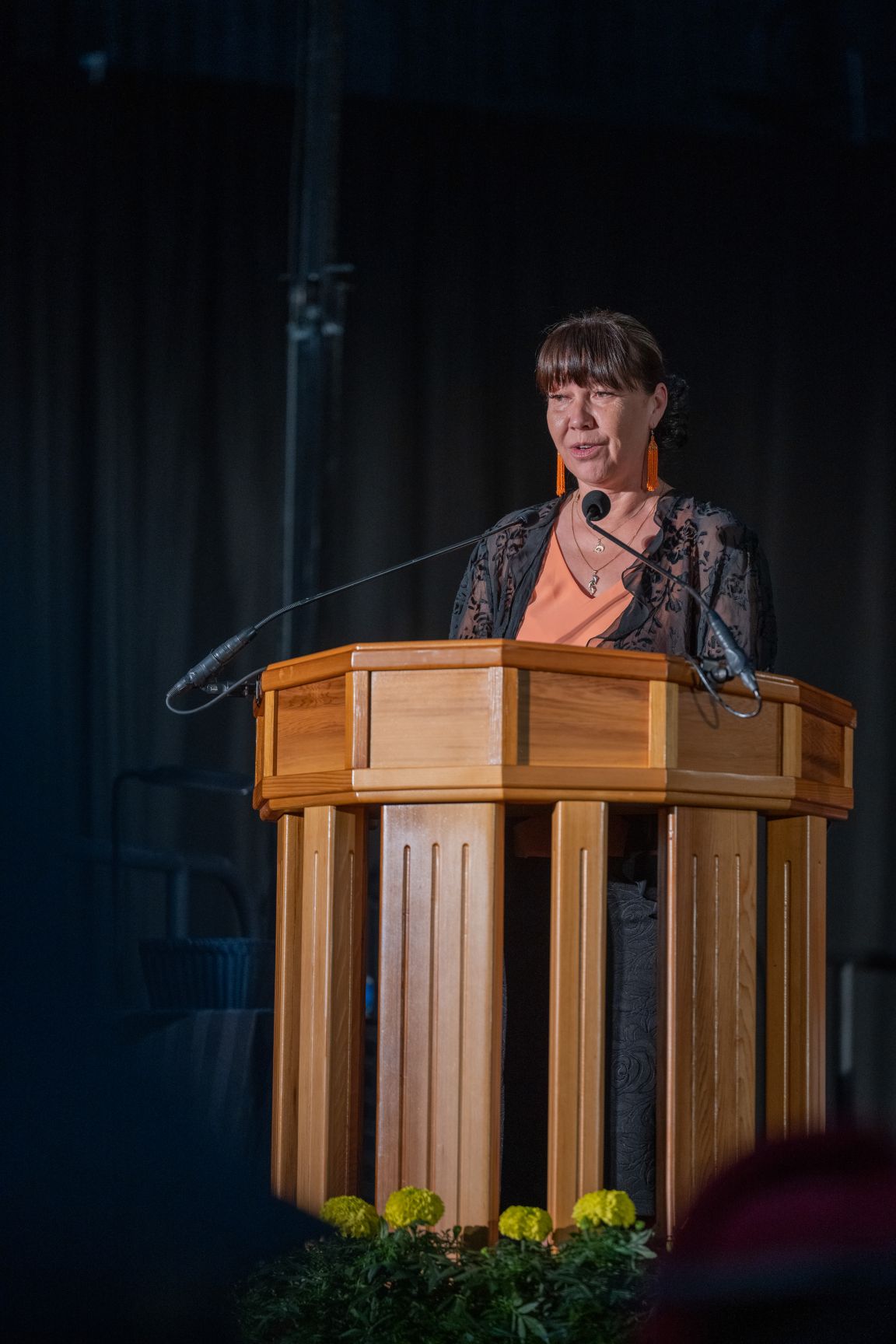 Presenter on stage
