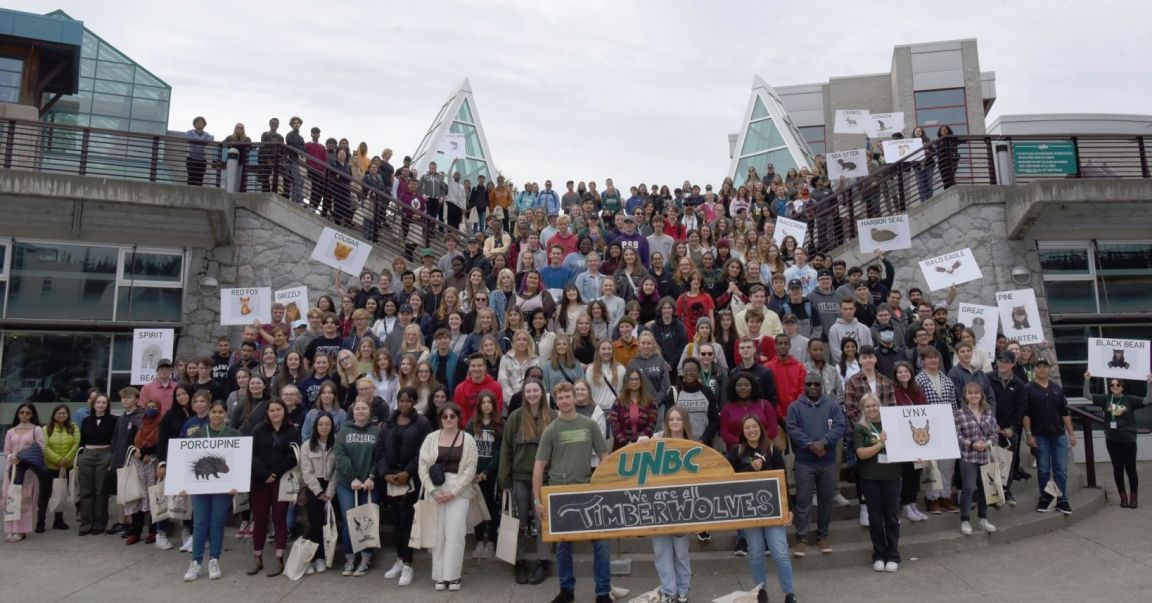 new UNBC students gathered on the courtyard steps