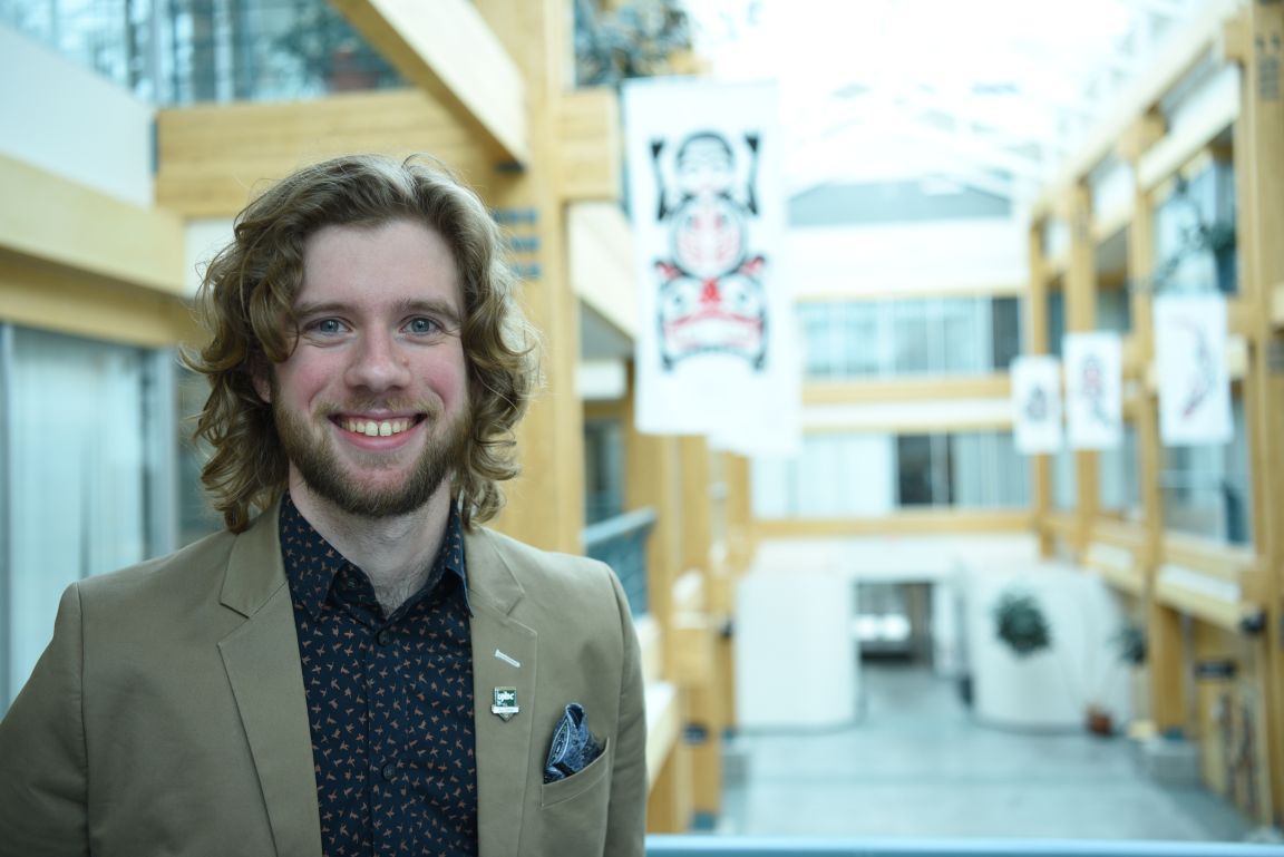 UNBC graduate Aaron Larson in McCaffray Hall