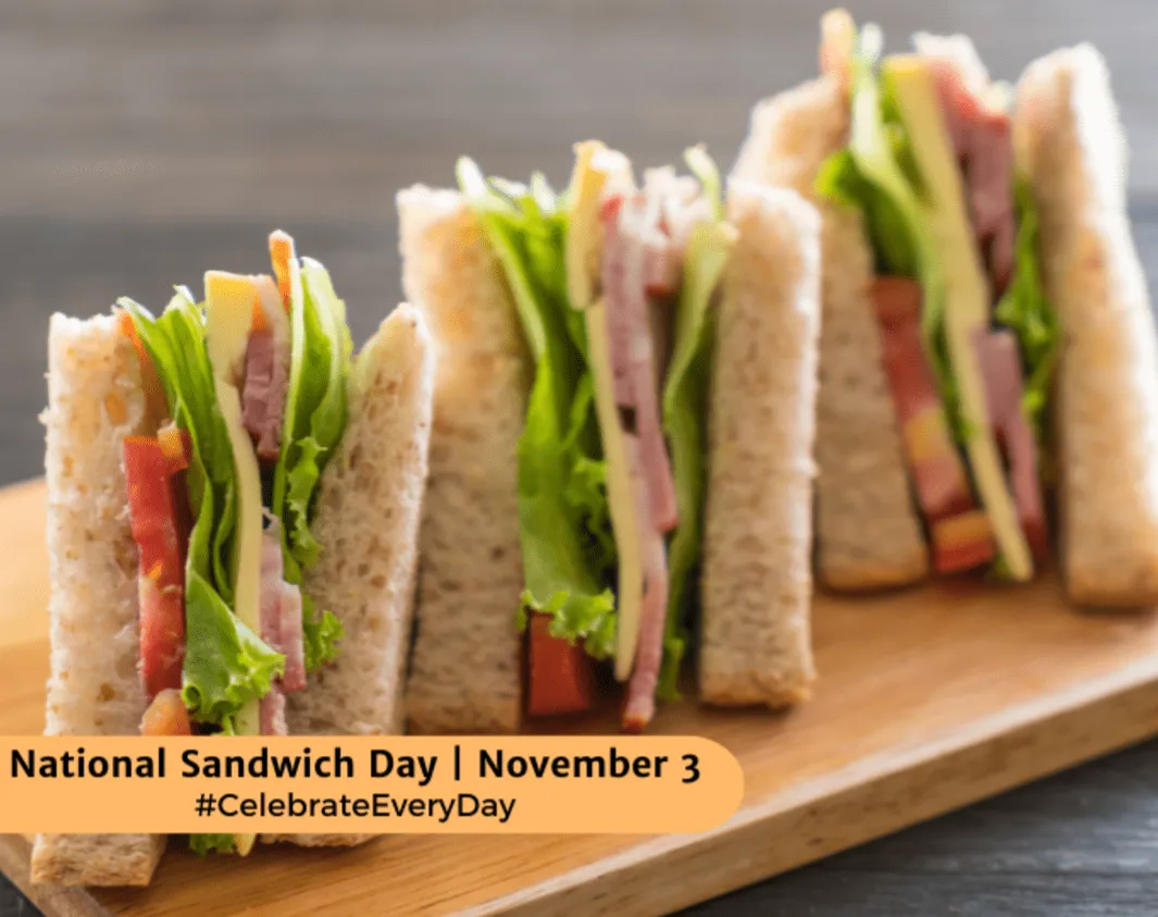 A picture of three sandwiches on a board