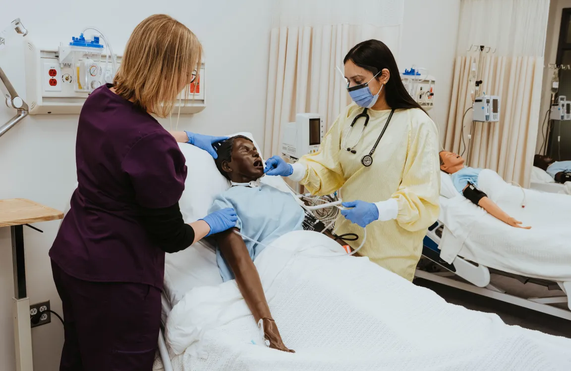 An instructor and student in UNBC's nursing lab at the Prince George campus.