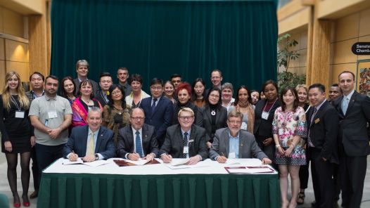 Four university and college Presidents sign an MOU