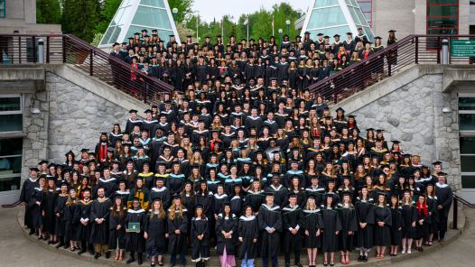 UNBC graduates pose for the class photo 