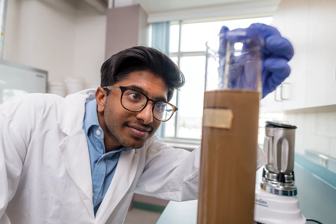 UNBC student working in a lab