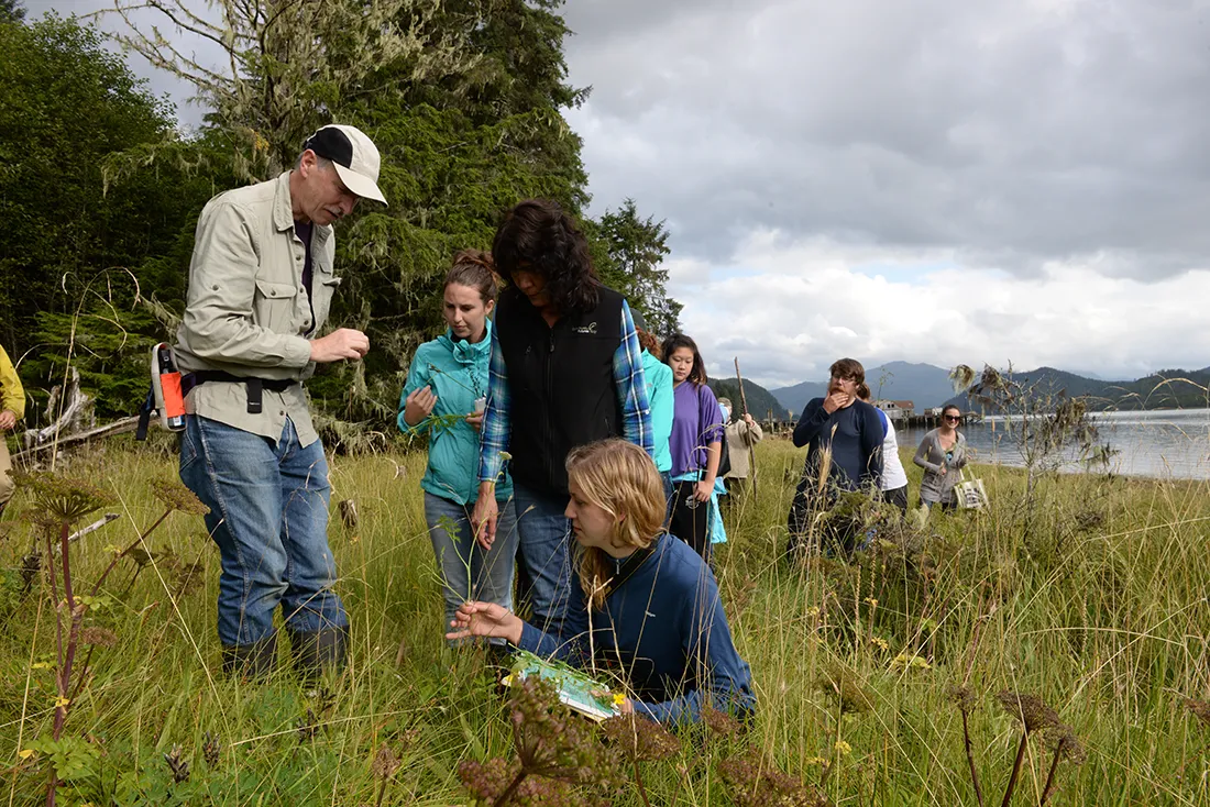 People outside at a field school