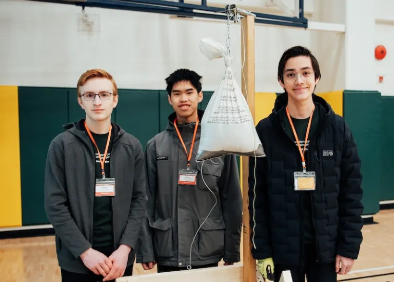 Overall winning team from DP Todd Secondary School pose next to their designed apparatus.