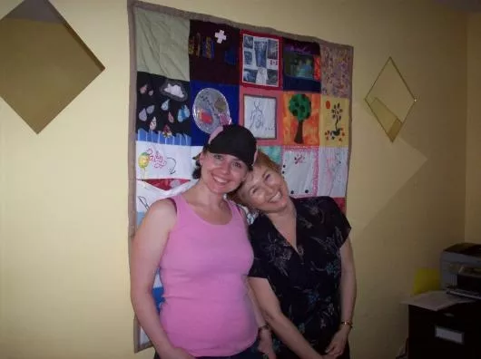 Si with a student at a FFRG meeting