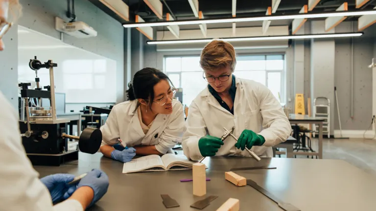 Two UNBC students in the lab