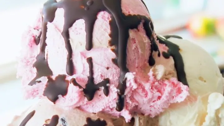 A picture of ice cream with toppings