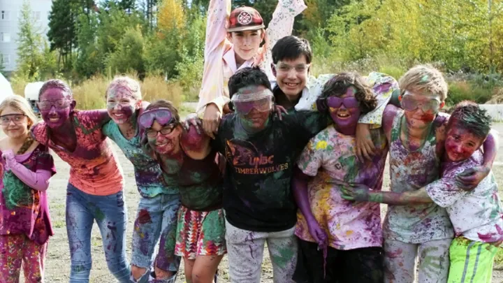 Group of kids covered in paint