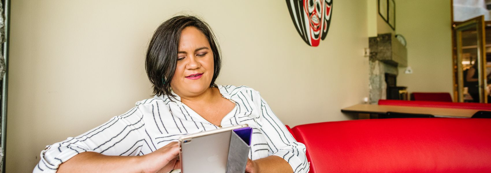 student seated at First Nations Centre