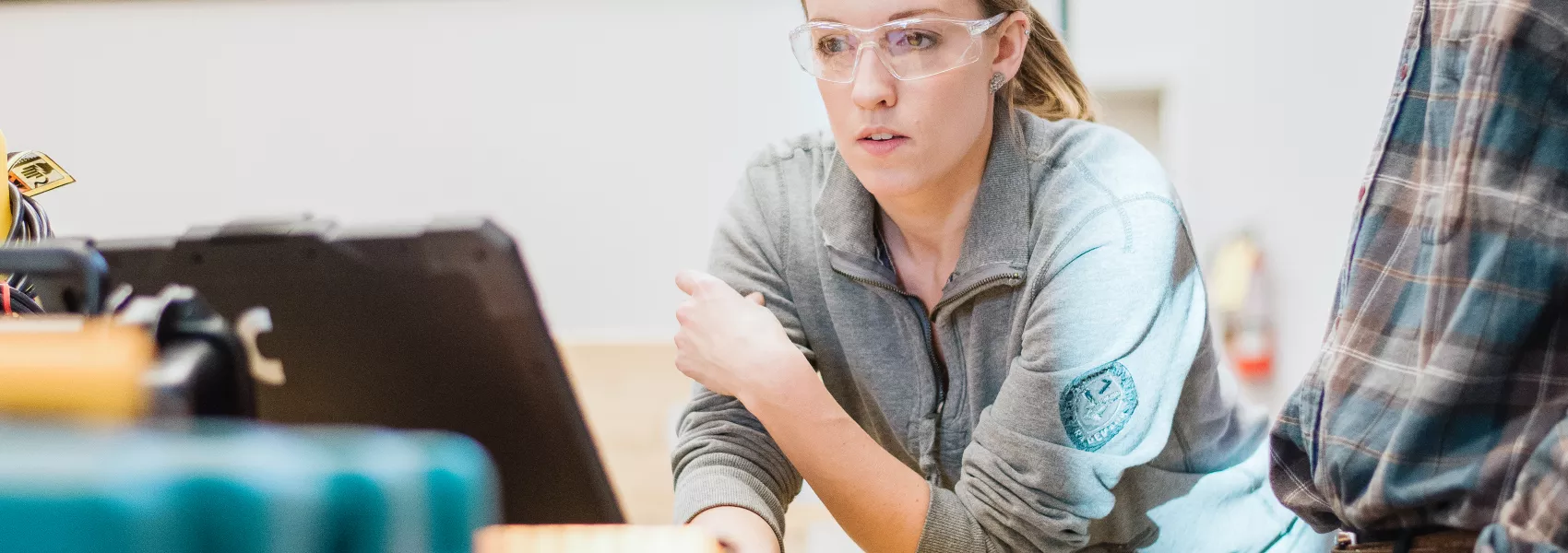 UNBC Student reviewing a computer